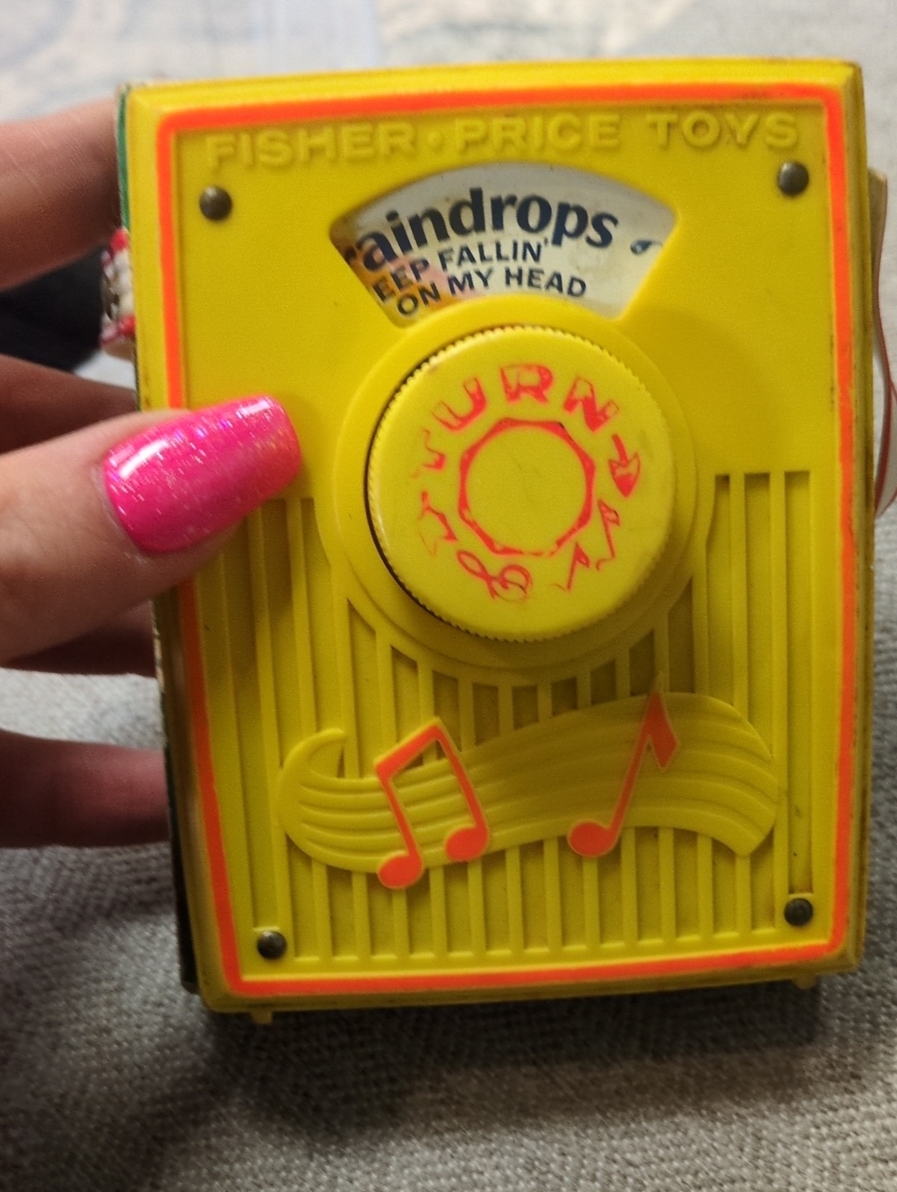 Fisher-Price Yellow Portable Turn-to-Play Music Player